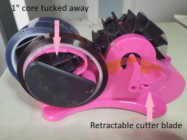 the Echomerx tape dispenser with the 1" core tucked away in a special spot. The retractable blade is also highlighted in the picture