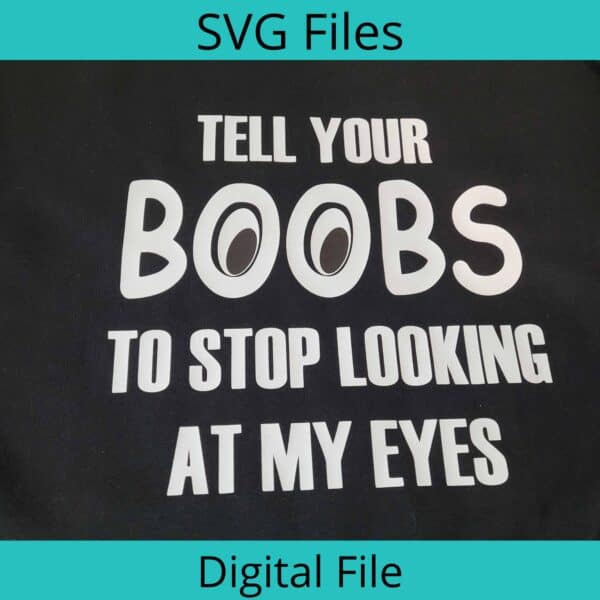 Tell Your Boobs To Stop Looking At My Eyes SVG file on a black T-Shirt with white writing.